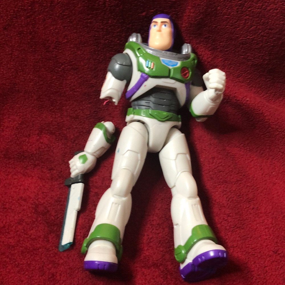 Buzz Lightyear, broken right arm but it’s still Buzz